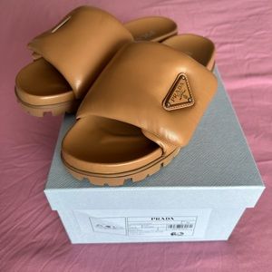 Brand new! In box. Prada Puffy Slides in soft tan leather size 39